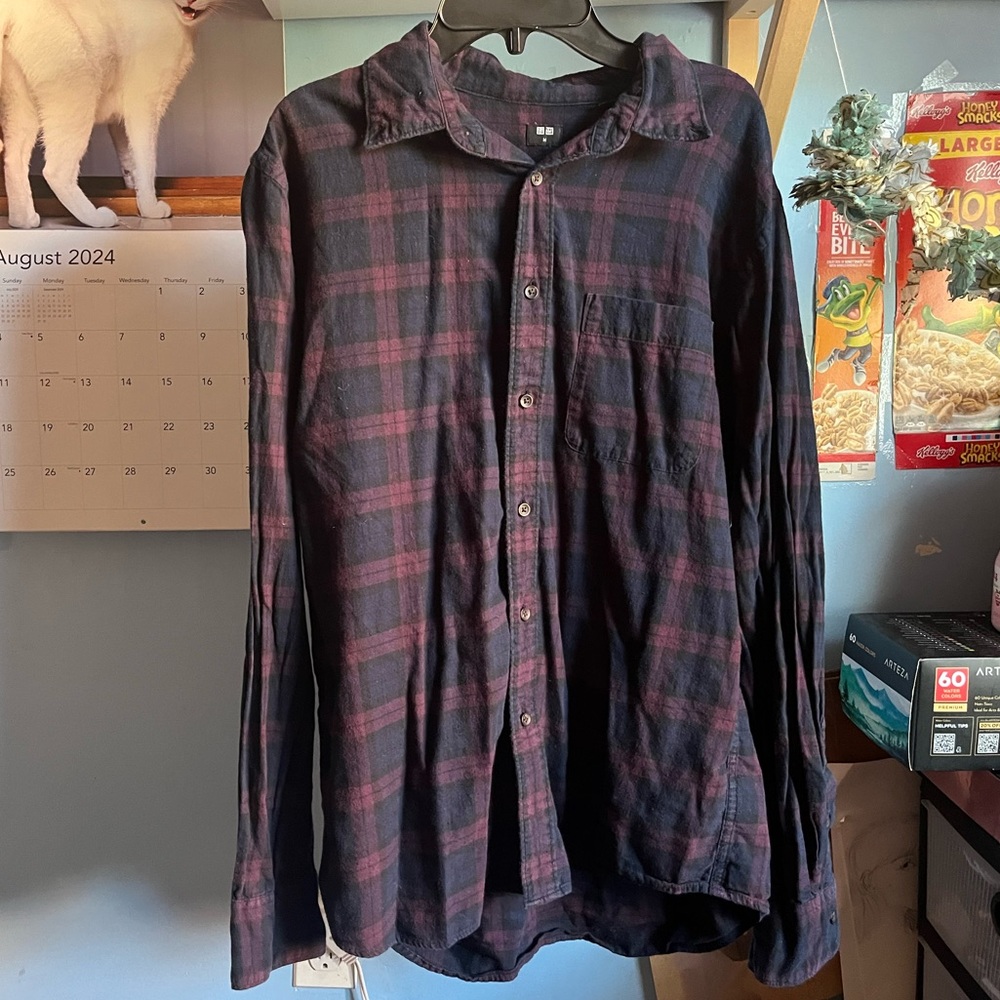 Plaid flannel button down shirt.